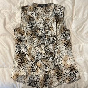 Satin print button up tank with ruffled front cover buttons.